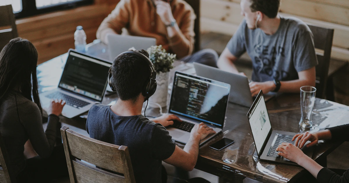 Small business team photographed in their working environment
