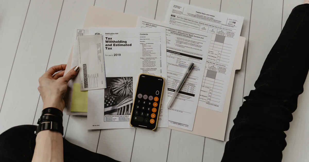 Business owner reviewing a written quotation document at a desk